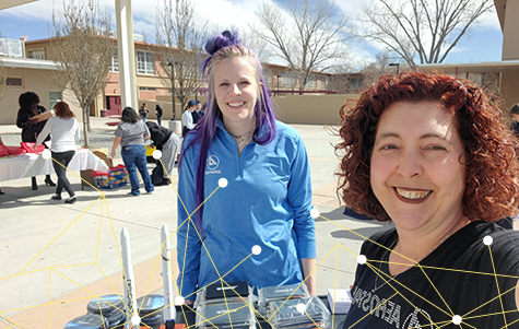 Portrait of Aerospace employees at a community event