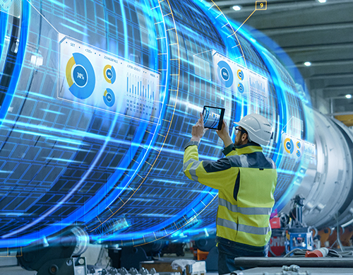 Person scanning vacuum chamber with tablet