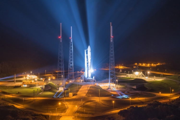 Picture of Atlas V rocket awaiting takeoff on the launch pad.