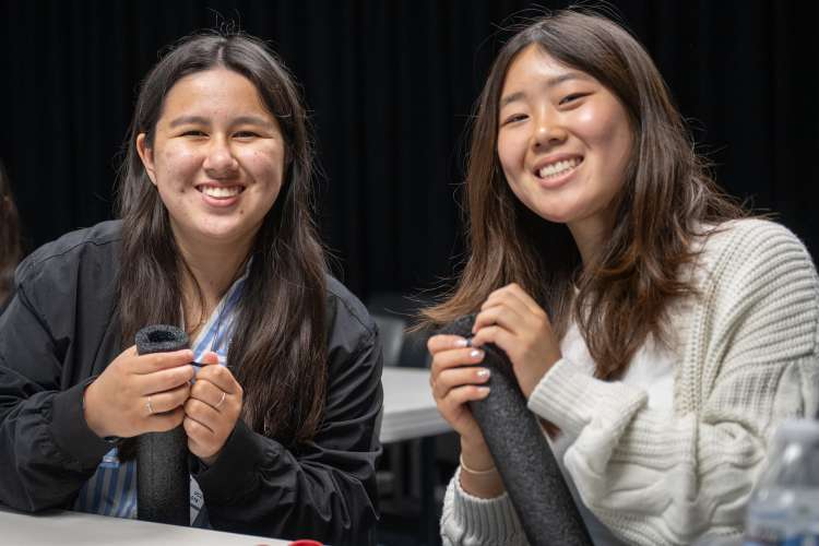 Two students smiling at Aerospace Institute.