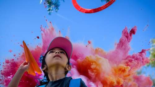 Child looking up at the sky.