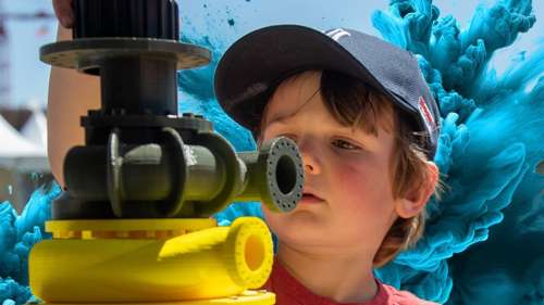 Child looking at machinery.