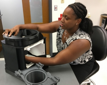 Woman working with 3D model of NIRAC